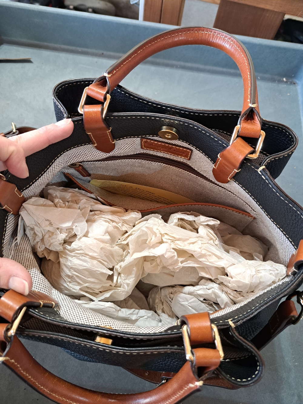 Dooney & Bourke Black and Brown Pebbled Leather Tote with Gold Accents - Picture 4 of 5